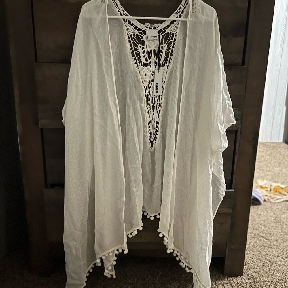 Cute shaw with lace design. Brand is sonoma